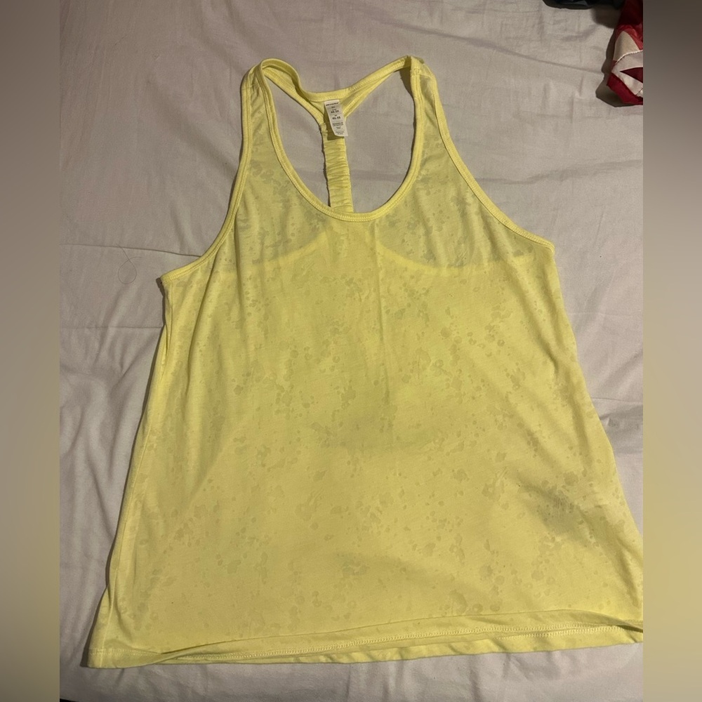 yellow mesh-like athletic tank top